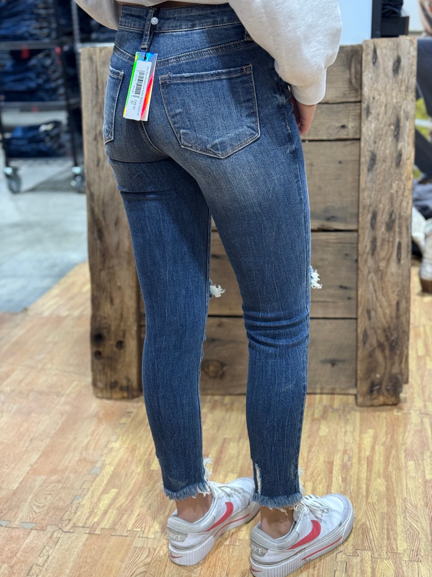 The Mid Rise Distressed Ankle Skinny Jean